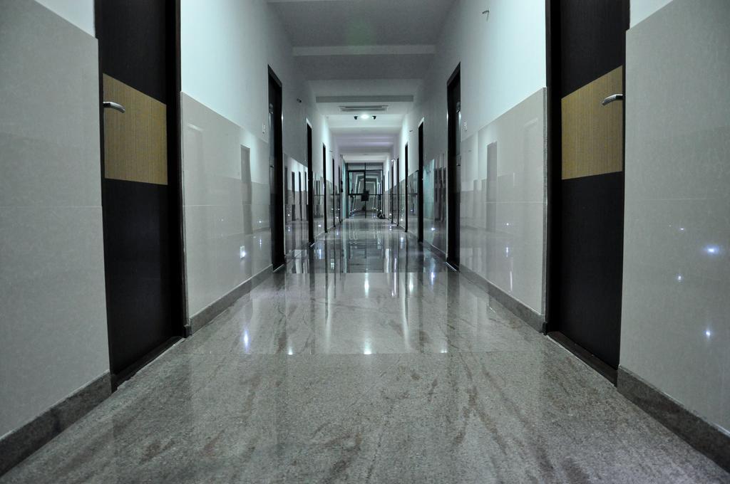 Hotel The Home Tiruppur Pokoj fotografie