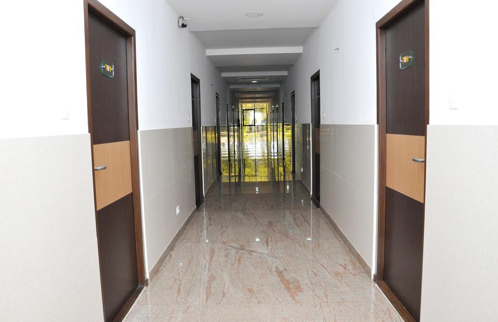 Hotel The Home Tiruppur Pokoj fotografie